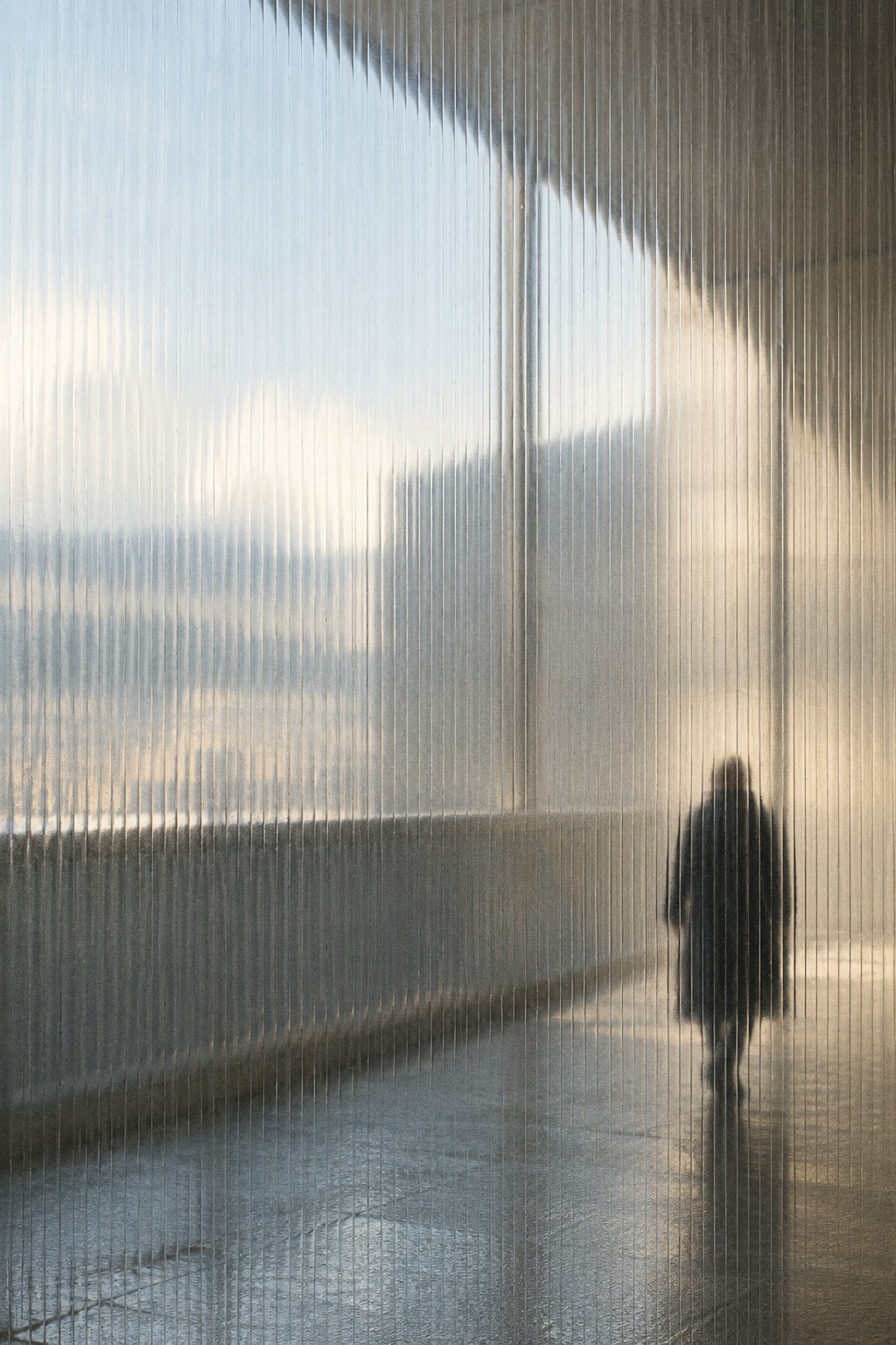 Filtered daylight through ribbed glass